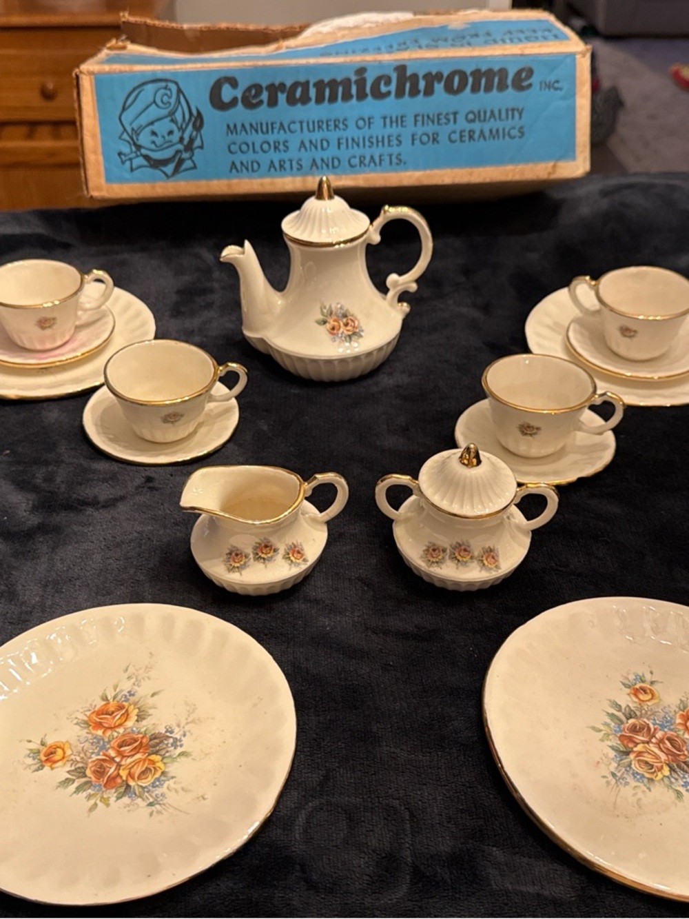 Vintage mini porcelain tea set w/ tea pot, cups and saucers.  Ceramichrome